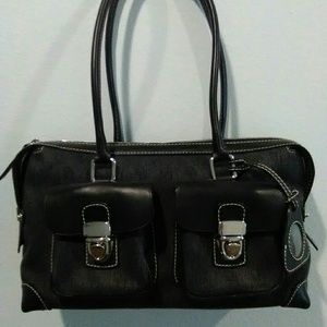 Dooney & Bourke's black denim and leather hand bag